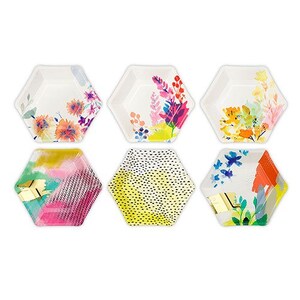 May include: Set of six hexagonal paper plates with floral and abstract designs. The plates feature a variety of colors, including pink, yellow, blue, and green.