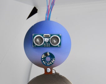 Bot robot art figure made from recycled materials industrial techie art steampunk sculpture computer hard drive disc