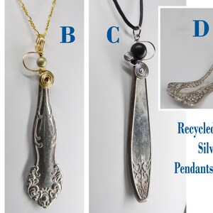 May include: Four silverplate silverware pendants handcrafted from recycled materials. The pendants are all different shapes and sizes, and they are all decorated with intricate designs. The pendants are hanging from chains or cords.