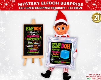 May include: A toy elf doll holding a silver foil mystery squishy package labeled ELFDOH with a blue cube graphic. Beside it, a black sign on a wooden easel reads ELFDOH Shhh... It's a mystery surprise! Eight colors, Endless squish! COLLECT THEM ALL!
