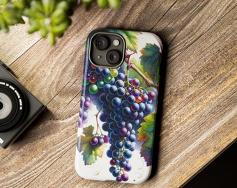 May include: A white phone case with a colorful illustration of a bunch of grapes. The grapes are purple, blue, and green. The case has a camera cutout in the upper left corner.