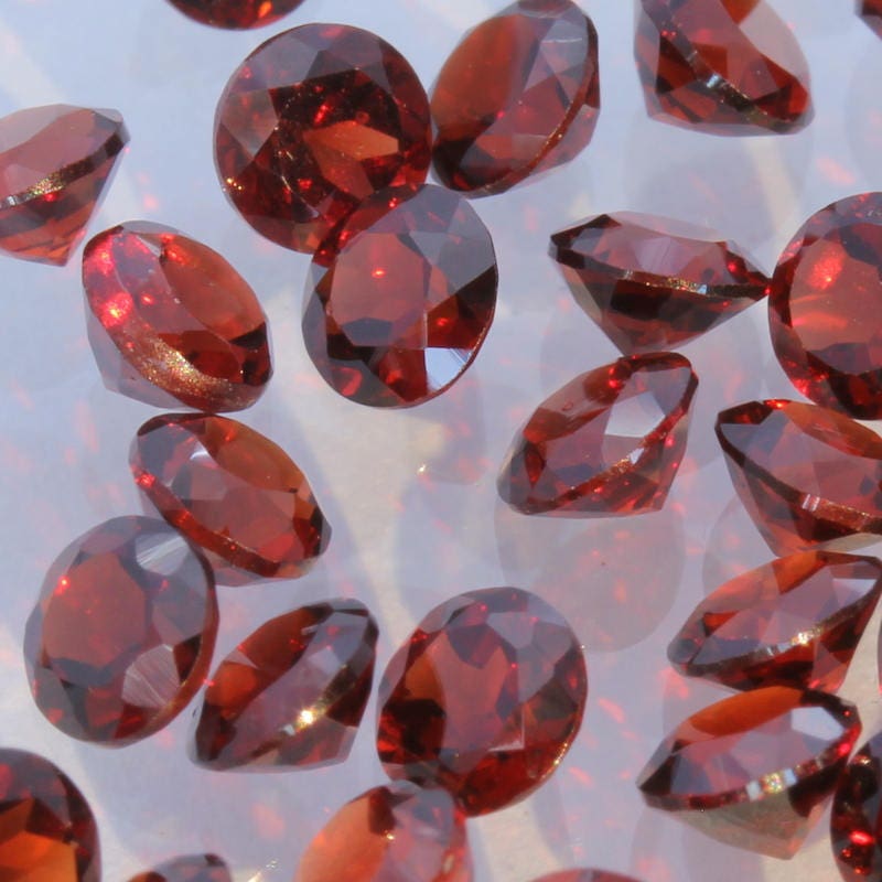 One Red Orange Almandine Garnet Faceted 3.5 mm Round Gemstone Average .22 carat 