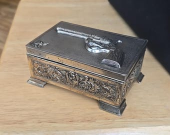 Vintage Mid-Century Metal Trinket Box with sn Embossed Single Action Revolver on Top