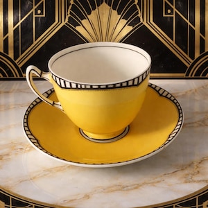 Vintage Paragon Art Deco theekop en schotel in geel