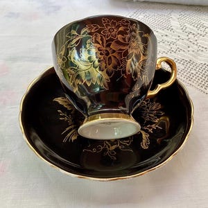 Tuscan china black and gold cup and saucer