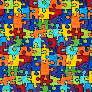May include: A colorful fabric with a repeating pattern of puzzle pieces in shades of blue, green, red, yellow, and orange.