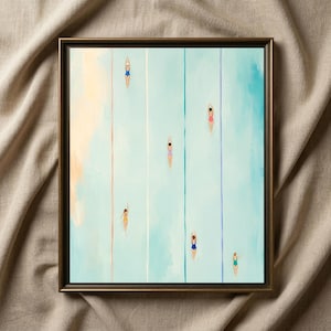 May include: A framed wall art print featuring an aerial view of a swimming pool with light blue water and vertical lane markers. Several swimmers in colorful one-piece swimsuits are depicted in the water, each positioned within their own lane.