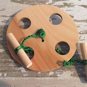 Handcrafted Wooden Toy Spinning Wheel: Coordination Exercise