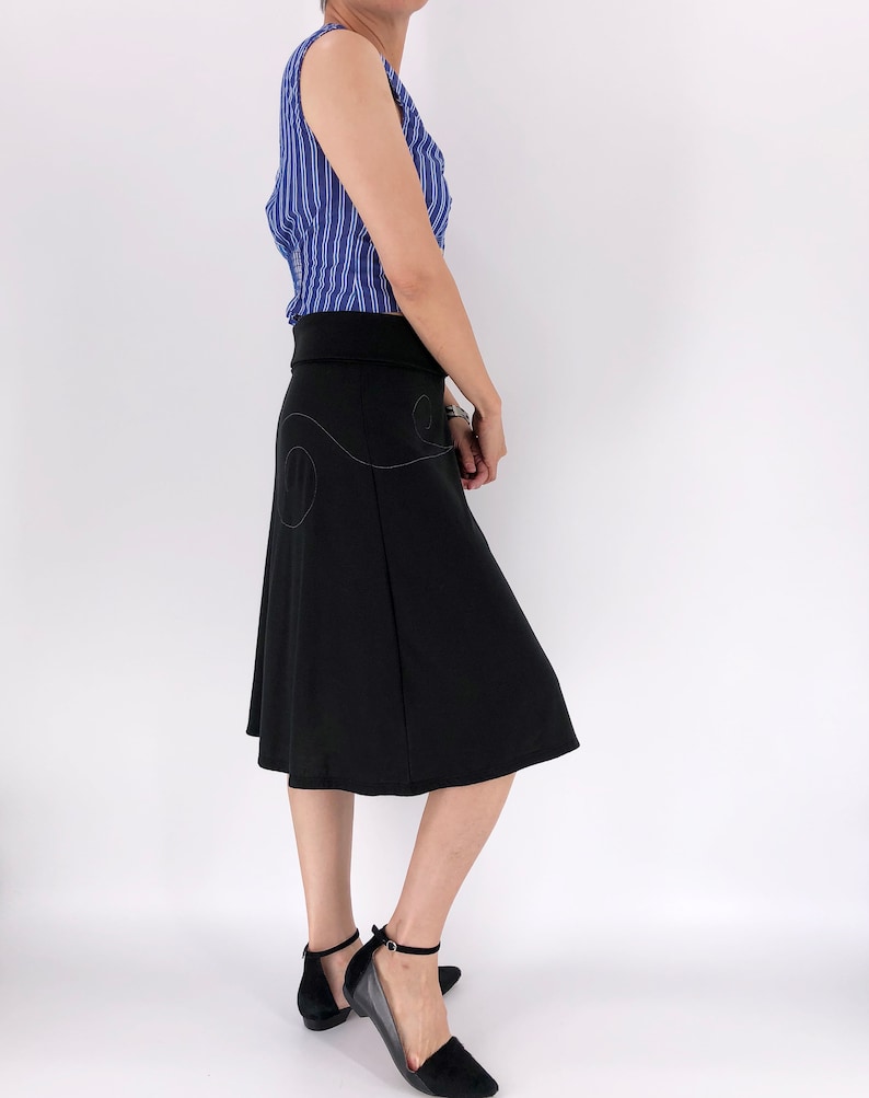 Black jersey knit skirt with white modern line drawing and swirling sewing stitch lines, A-line midi black skirt in size S and M image 2