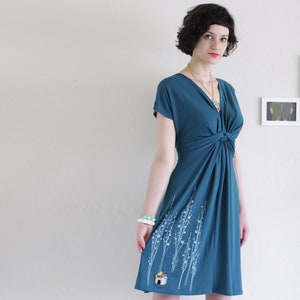 Jersey knit teal dress with forest print and tiny house applique, Knee length V-neck goddess dress with tree print cottage patch Size S image 2