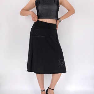 Black jersey knit skirt with white modern line drawing and swirling sewing stitch lines, A-line midi black skirt in size S and M image 9