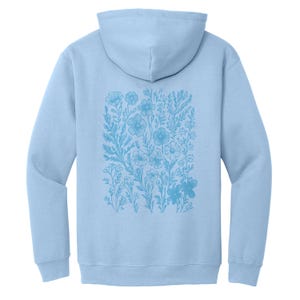 May include: A light blue hoodie with a floral design printed on the back. The design features a variety of flowers and leaves in a light blue color.