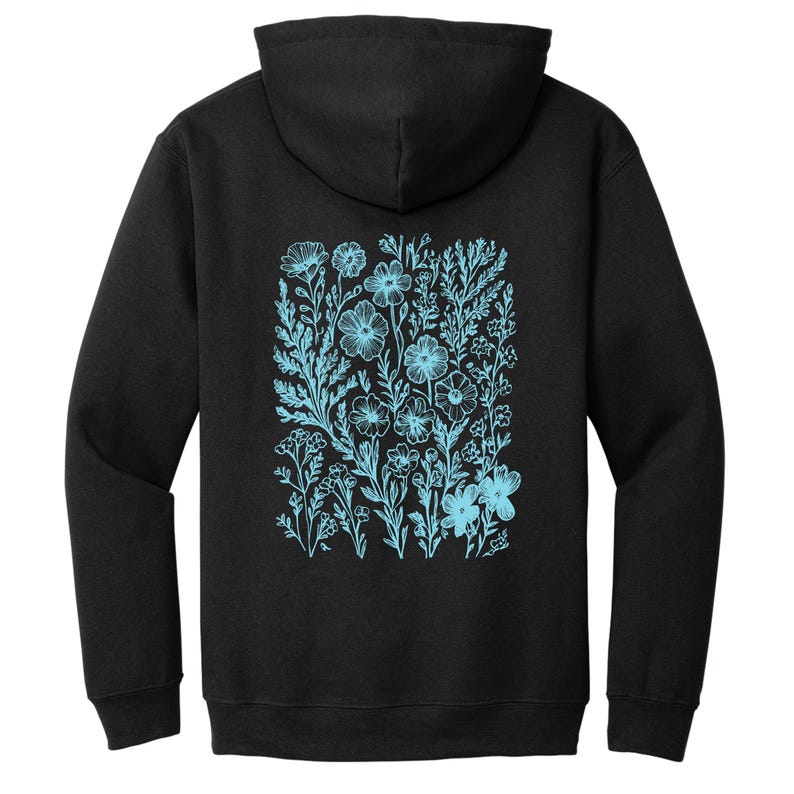 May include: Black hooded sweatshirt with a light blue floral design on the back.