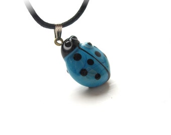 Blue Ladybug Evil Eye Pendant