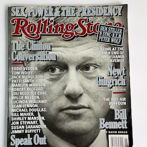 May include: A magazine cover featuring a black and white photo of Newt Gingrich with the title "Rolling Stone" and the text "Sex, Power & The Presidency". The cover also features the text "The Clinton Conversation" and a list of names including Eddie Vedder, Tom Wolfe, Jack Nicholson, Patti Smith, Marilyn Manson, Robert Redford, Lou Reed, Ice Cube, Willie Nelson, Lucinda Williams, Sean Lennon, Michael Douglas, Bill Maher, Shirley Manson, Jon Stewart, Susan Sarandon, and Jimmy Buffett. The cover also features the text "Newt Gingrich" and "The Hot-Air Buffoon" and "Bill Bennett".