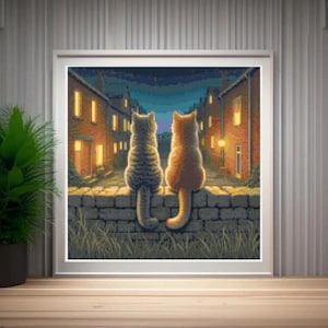 May include: Two cats, one gray and one orange, sit side-by-side on a brick wall, looking out at a city street at night. The street is lit by streetlights and windows.