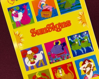 May include: A yellow sticker sheet titled SunSigns featuring twelve colorful square illustrations representing zodiac signs. The sheet includes a heart logo and the text @recycloves sticker sheet. Each square depicts a unique character or animal.