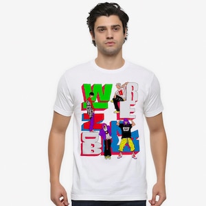May include: White t-shirt featuring a colorful graphic design with the text "WREDB". The design includes stylized figures in various poses, with green, red, and blue accents. The shirt is a casual, everyday wear item.