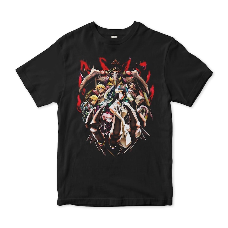 May include: Black t-shirt with a graphic print of a group of anime characters in a dark fantasy setting. The characters are surrounded by red and black flames.