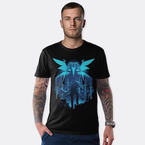 May include: A black t-shirt with a blue and white graphic print of a character holding a sword in front of a winged creature.