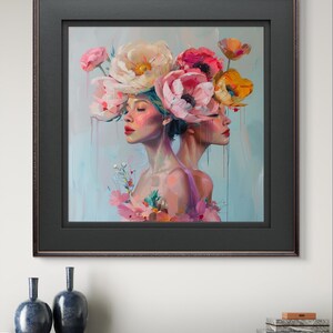 Puede incluir: Una pintura de dos mujeres con sus caras giradas hacia un lado. Ambas llevan una corona de flores rosas, blancas y amarillas. El fondo es azul claro.
