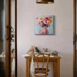 Puede incluir: Una pintura de dos mujeres con flores en la cabeza. Las mujeres miran hacia adelante y tienen los ojos cerrados. Las flores son rosas, blancas y amarillas. El fondo es azul claro.