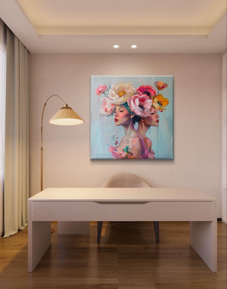 Puede incluir: Una pintura de dos mujeres con sus cabezas entrelazadas, llevando una corona de flores coloridas. El fondo es azul claro con un toque de verde.