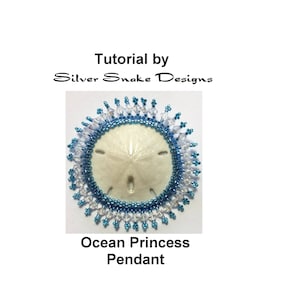 May include: A beaded pendant featuring a white sand dollar in the centre, surrounded by blue and white beads. The pendant is labelled "Ocean Princess Pendant" and "Tutorial by Silver Snake Designs".