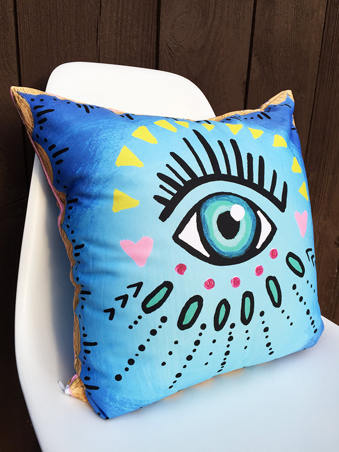 evil eye throw pillow