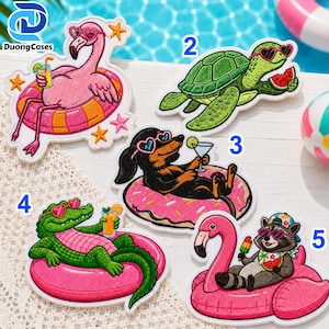 May include: Five embroidered patches featuring summer themes: a pink flamingo in a pool float, a green sea turtle eating watermelon, a black dog in a donut float with a drink, a green alligator in a pink float, and a raccoon in a flamingo float.