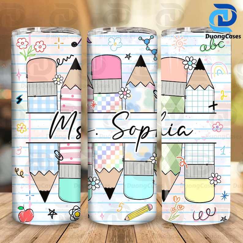 May include: A personalized tumbler featuring a school-themed design. The design includes pencils, erasers, flowers, and the name "Ms. Sophia" on a lined paper background. The tumbler also has the text "abc" and "DuongCases".
