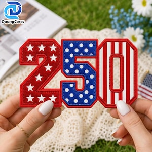 May include: A decorative patch featuring the number 250. The number 2 is red with white stars, the number 5 is blue with white polka dots, and the number 0 features vertical red and white stripes. Each digit has a thick red embroidered border.