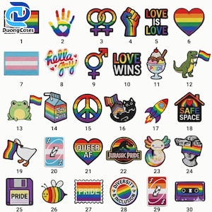 May include: A collection of thirty embroidered patches featuring various designs including rainbow flags, hearts, animals, and text such as Love is Love, Love Wins, Safe Space, Queer AF, Jurassic Pride, and Pride, arranged in a grid with numbered labels.