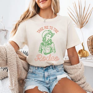 Retro westerncowboyshirt, T-shirt Take Me To The Rodeo, vintage cowgirl graphic T-shirt, grappig westerncadeau voor haar en hem, unisex shirt