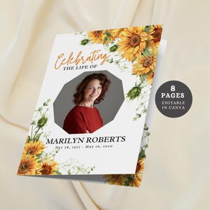 May include: A white memorial card with a photo of Marilyn Roberts, framed by sunflowers and greenery. The card reads "Celebrating the Life of Marilyn Roberts" with her birth and death dates. A circular graphic indicates the card has 8 pages and is editable in Canva.