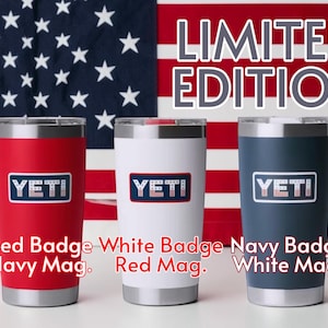 May include: Three insulated tumblers in red, white, and navy blue, each with a silver rim and the "YETI" logo. The background features an American flag and the words "LIMITED EDITION". Below the tumblers are the words "Red Badge Navy Mag.", "White Badge Red Mag.", and "Navy Badge White Mag."