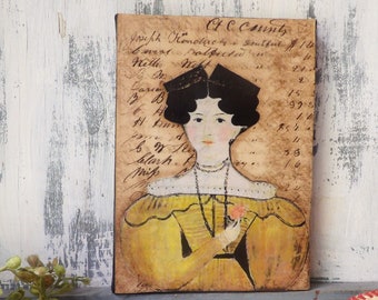 Folk art woman on canvas , Mixed media collage , 5x7 inch on antique ledger paper yellow dress