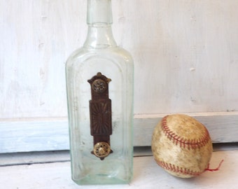 Altered antique aqua bottle , blue decorative glass, mixed media brass hardware N1