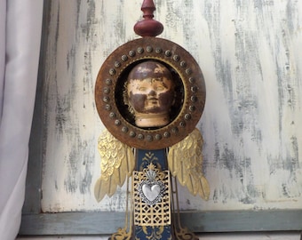 Clock case Assemblage Mixed media art found item shrine icon Blue Angel stand or wall