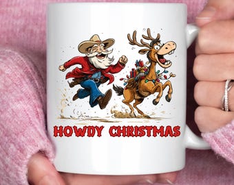 Howdy Christmas Mug, Cowboy Santa Coffee Cup, Funny Western Reindeer Mug, Country Christmas Gift, Rustic Cowboy Holiday Mug, Xmas Coffee Cup