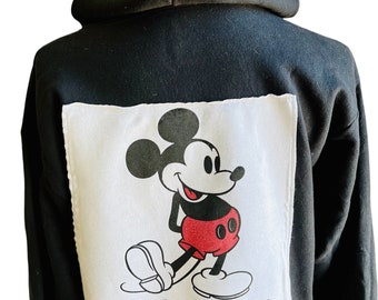 Mickey Mouse black hoodie unisex medium. Sweatshirt is Upcycled with an authentic Disney tee shirt and finished with embroidered pocket