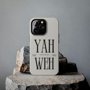 May include: A white phone case with a black design that says "YAH WEH" with the text "LORD OF LORDS", "THE ONE TRUE GOD", and "KING OF KINGS" underneath.