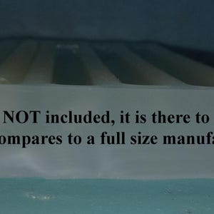 May include: A clear silicone mold for making glue sticks. The mold is shown next to a full-size glue stick to show the size comparison. "Glue stick is NOT included, it is there to show how the mold compares to a full size manufactured glue stick."