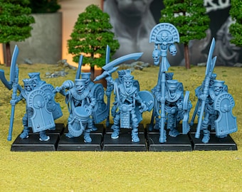 May include: A group of blue miniature skeleton warriors, each with unique weapons and shields. Some figures hold spears, swords, and shields with skull emblems. The miniatures are arranged on black bases, suggesting a tabletop game.