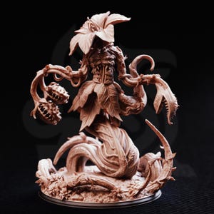 May include: A detailed, brown sculpture of a plant-like figure with a flower head, leaf-like clothing, and vine-like arms. The sculpture has a menacing appearance with sharp, tooth-like structures and a coiled base, set against a dark background.