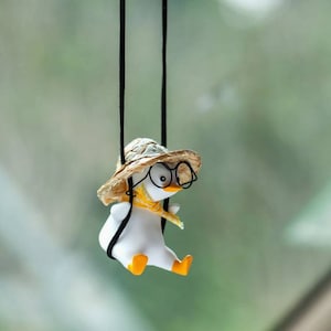 Car Pendant Cute Swing Duck Car Decoration Holiday Swing Duck With Glasses Rearview Mirror Pendant For Car Accessories 3d animal keychain