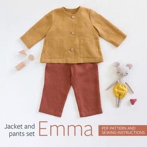 May include: A PDF sewing pattern for a mustard yellow jacket and rust coloured trousers for a child. The pattern is called "Emma" and includes sewing instructions.