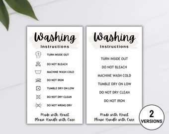 May include: Two printable washing instructions cards with a white background and black text. The cards include a list of washing instructions with corresponding symbols. The text on the cards reads "Washing Instructions" and "Made with Heart, Please Handle with Care".