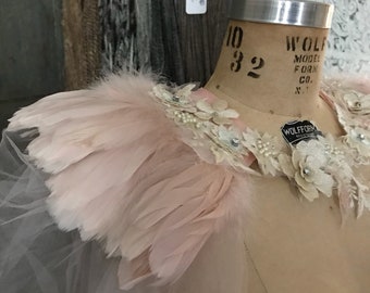 Unique blush tulle and feather cape