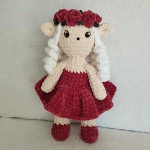 Handmade crocheted pink plush elf